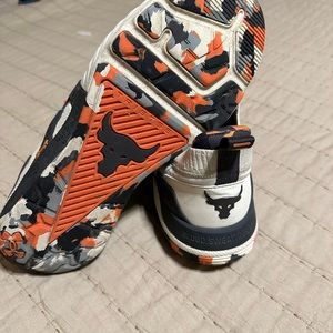 2 pairs of UA Project Rock trainers. Good condition. $80 per pair, $140 for 2